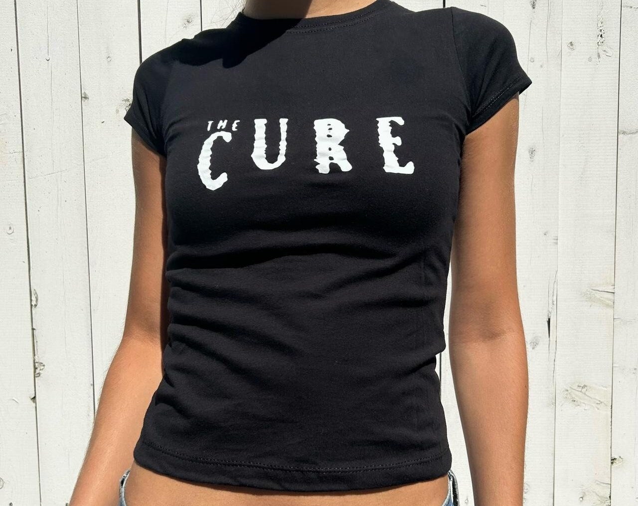 Vintage-inspired The Cure band baby tee for Y2K fashion lovers