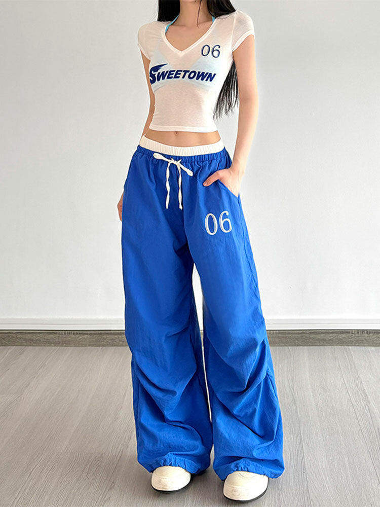 Color-Block Letter Short-Sleeve T-Shirt Top & Waist-Seamed Pleated Loose Dance Long Pants Set - Trendy Two-Piece Outfit