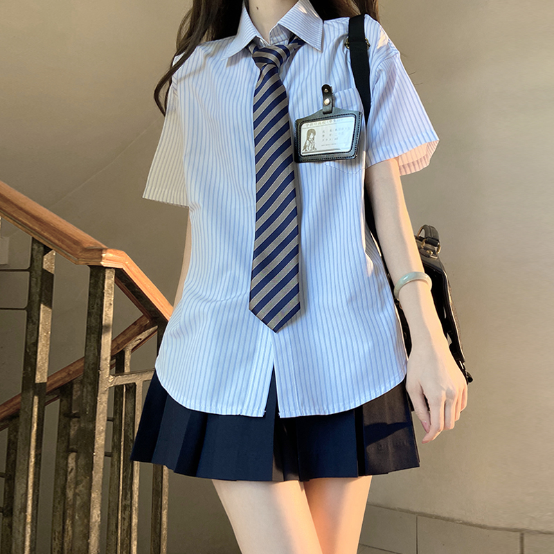 Four-Piece JK Uniform Set for Women: Striped Long Sleeve Shirt, Loose Fit, Pleated Skirt - Trendy 2024 Autumn Style