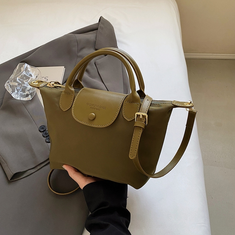 Korean-Style Retro Casual Bucket Bag for Women - Trendy Versatile Handheld Design, High-End Feel, Spring/Summer 2025 Collection